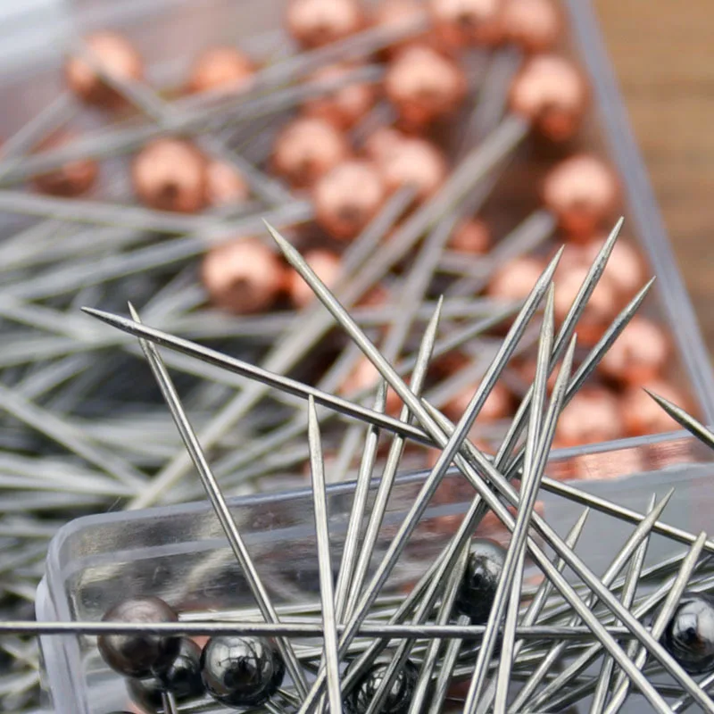 دبابيس الخياطه